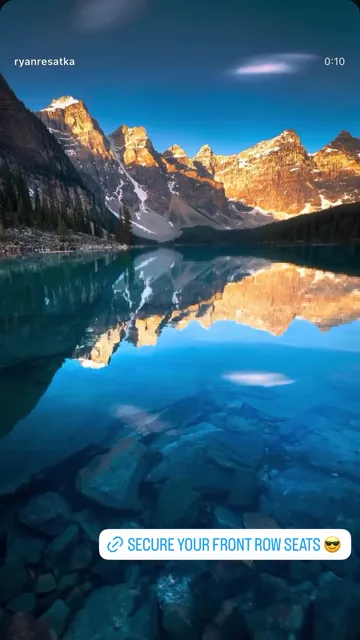 Golden sunrise reflecting on Moraine Lake and the Valley of the Ten Peaks