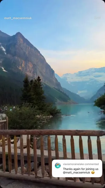 Lake Louise viewed from a wooden deck beneath the surrounding mountains