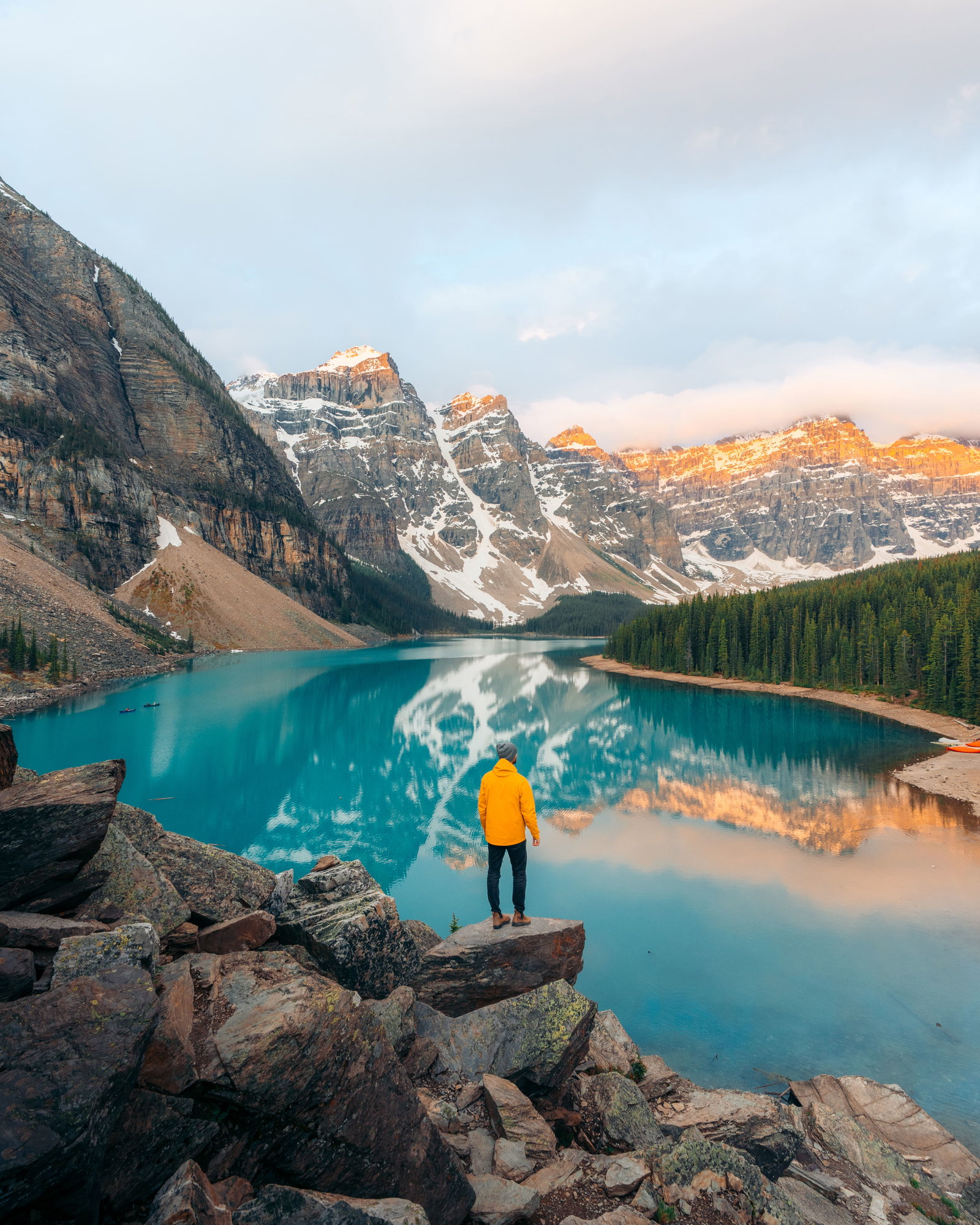 Moraine Lake sunrise with yellow jacket in the foreground