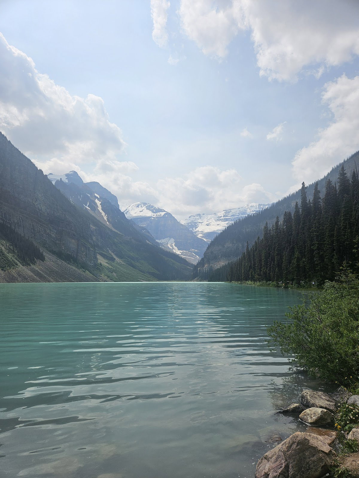 Lake Louise viewed from the lakeshore with Victoria Glacier in the distance