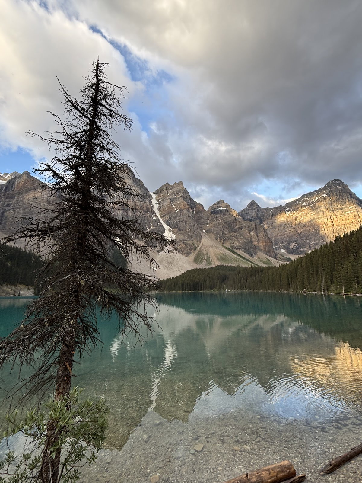 Morning light reflecting on Moraine Lake beneath the Valley of the Ten Peaks