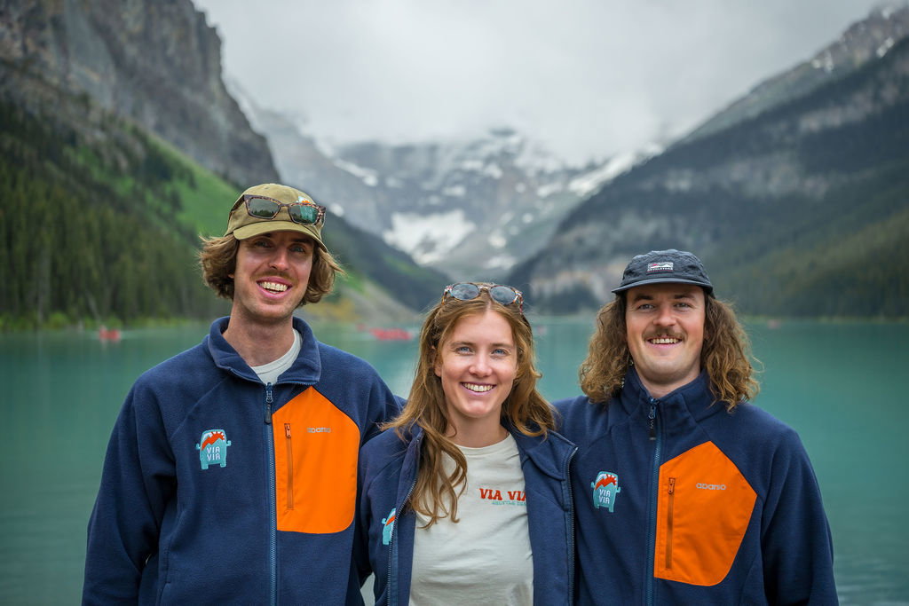 The Via Via 2025 team having fun at Moraine Lake in Banff National Park.